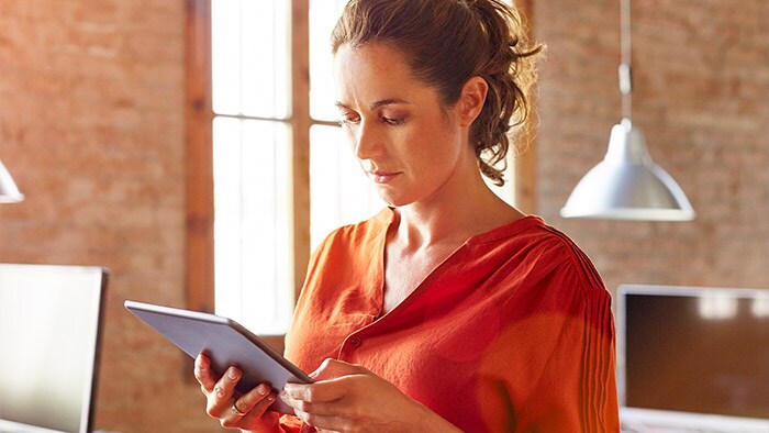 Female holding a tablet