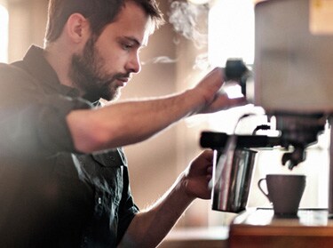 Barista making coffee